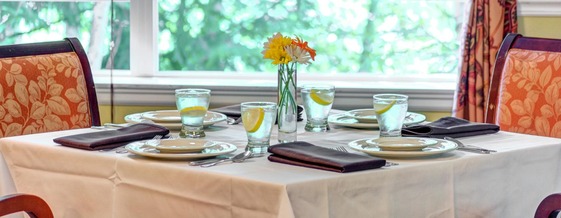 a table with plates and glasses on it